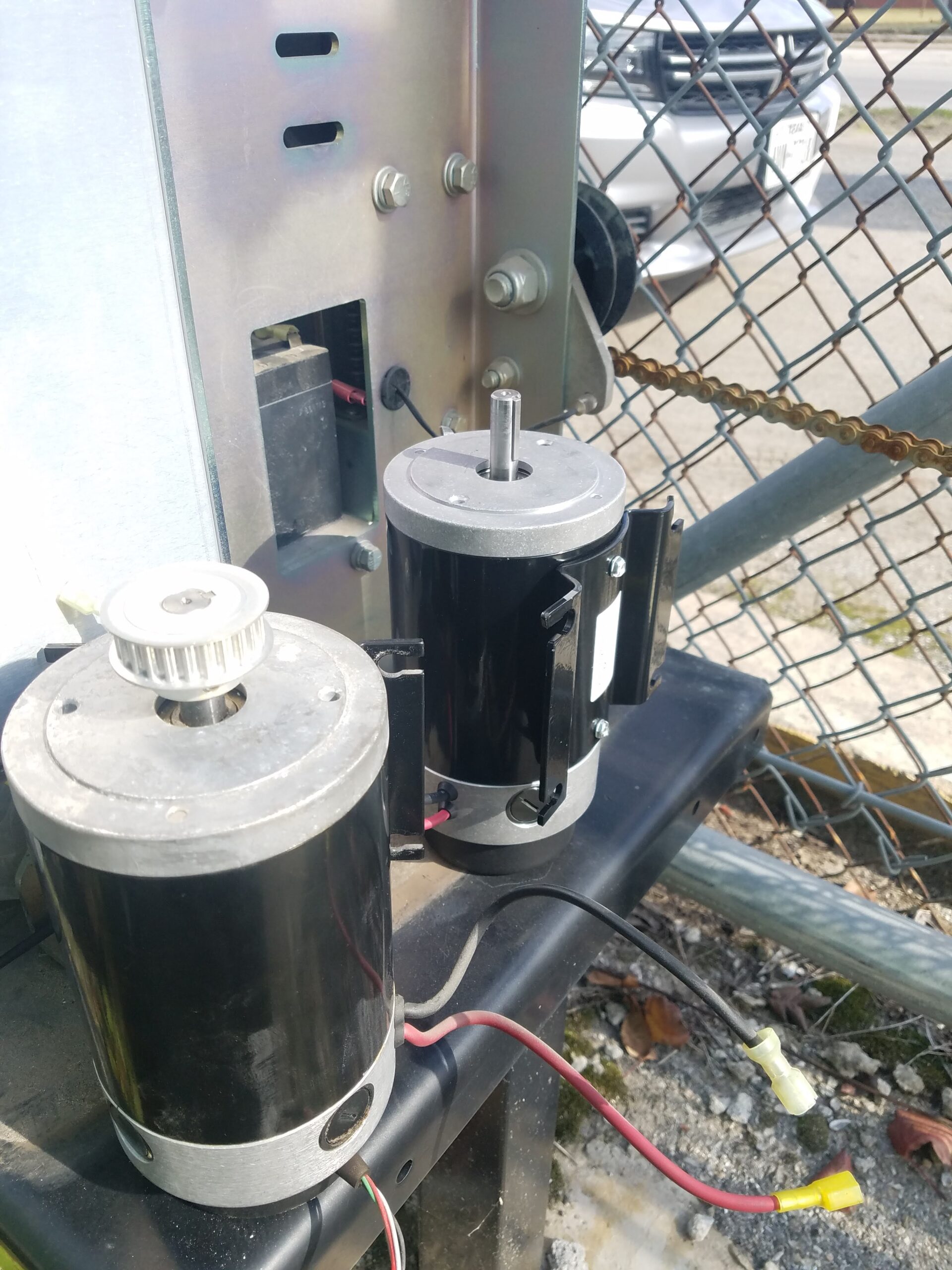 LiftMaster slide gate opener motor replacement during automatic gate repair in Houston TX