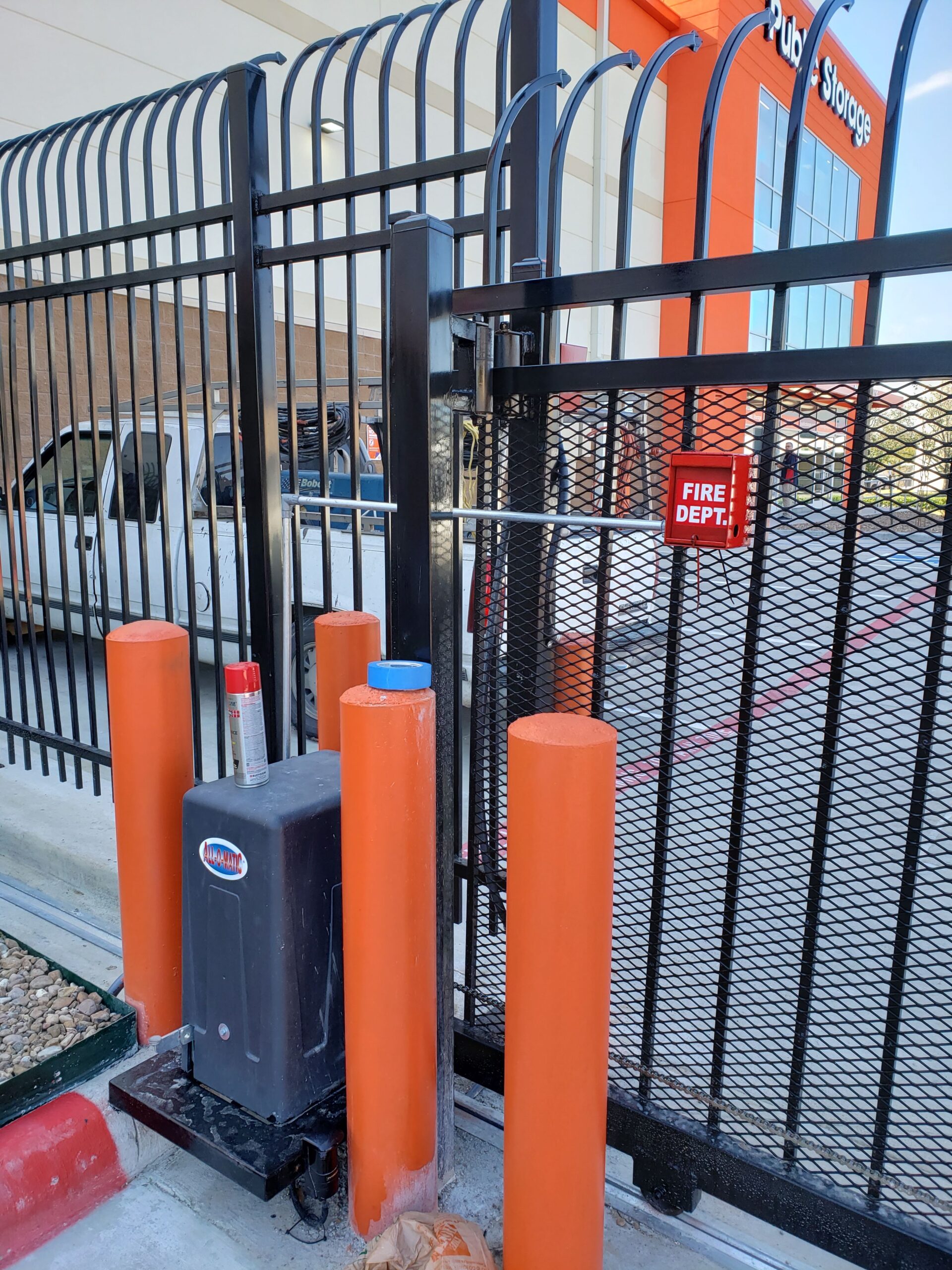 All-O-Matic commercial slide gate opener with 911 Knox lock at Houston storage facility