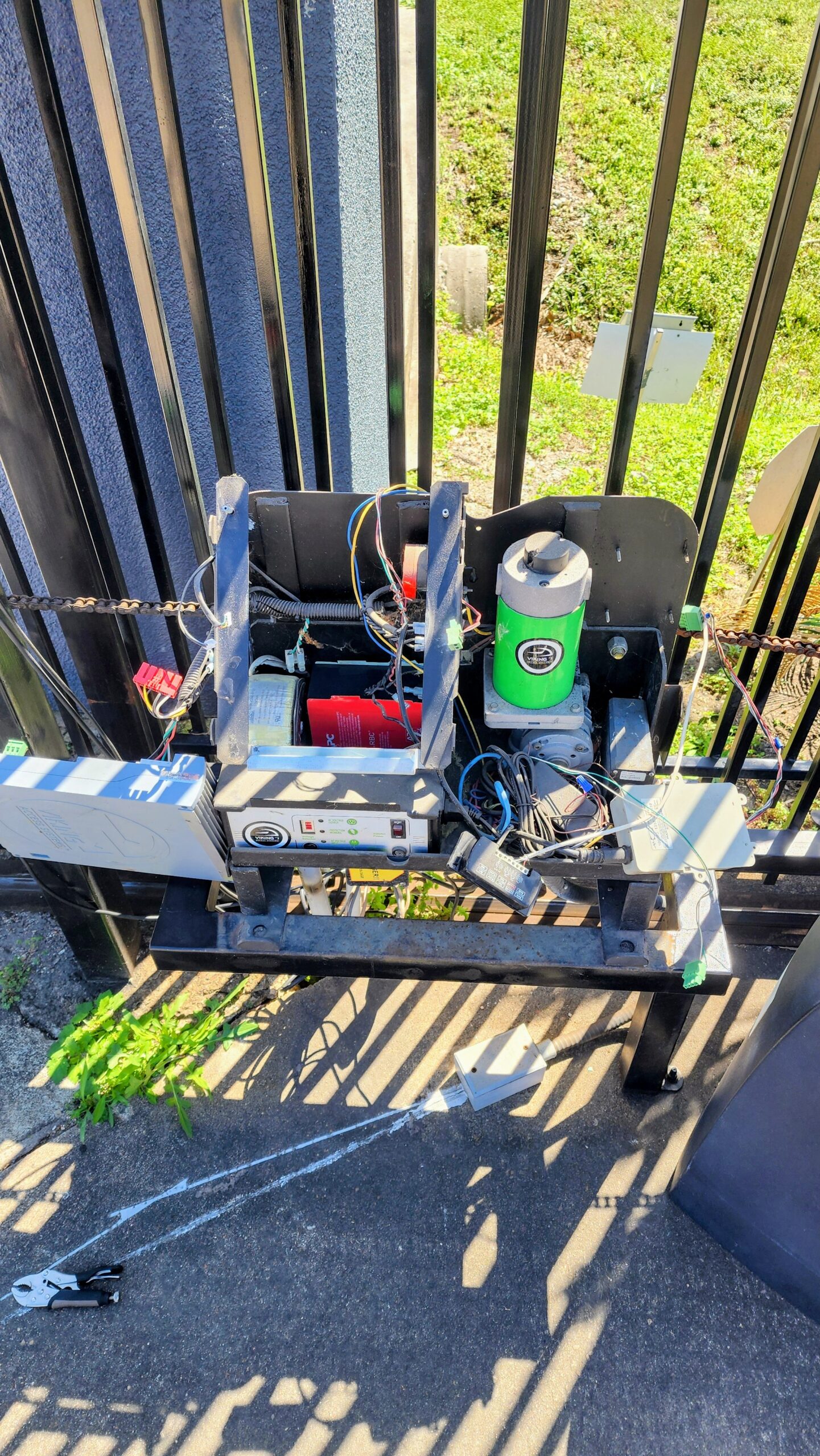 Viking K2 slide gate opener repair on an automatic gate in Houston TX
