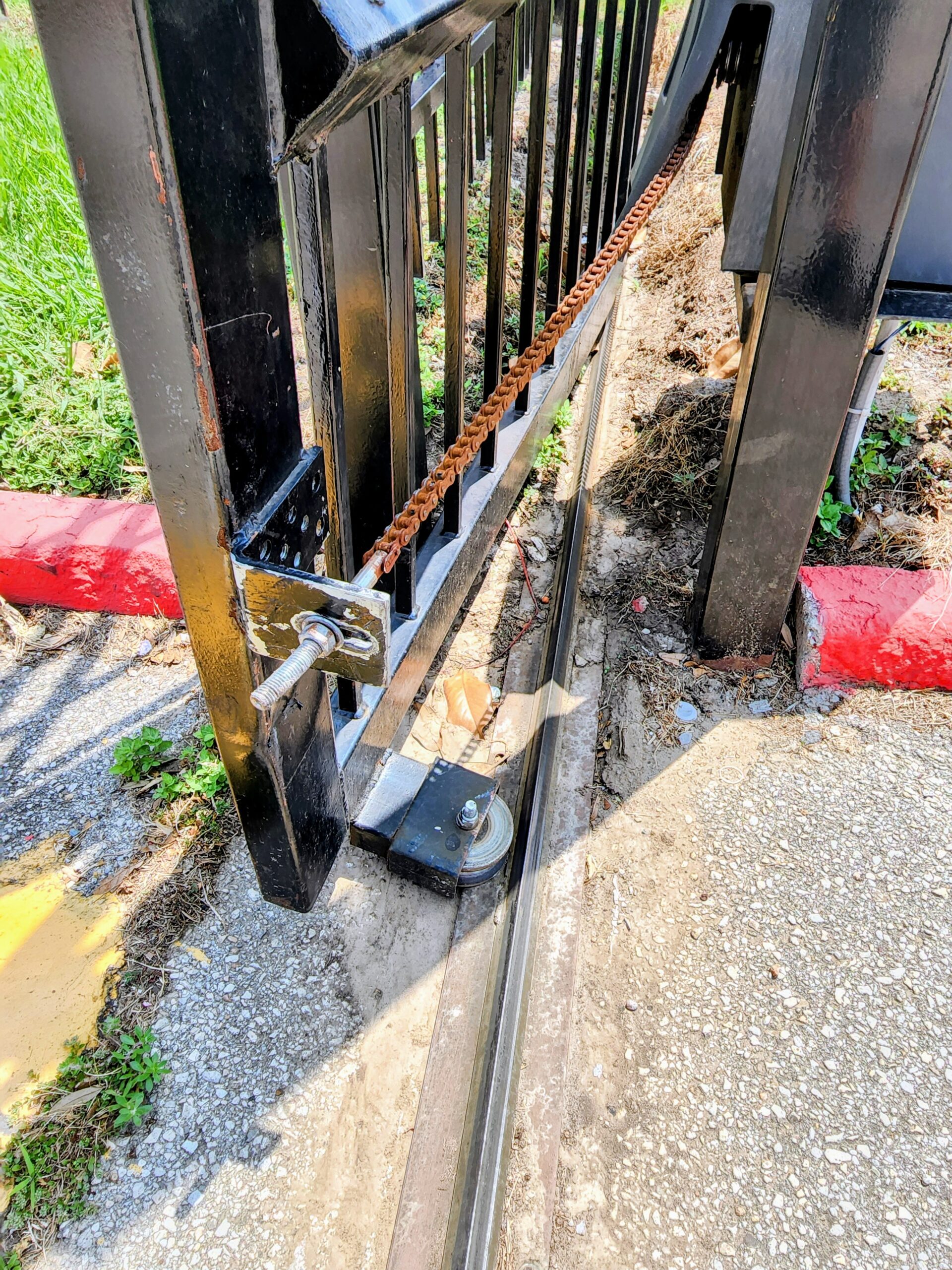 gate wheel repair on sliding gate in Houston