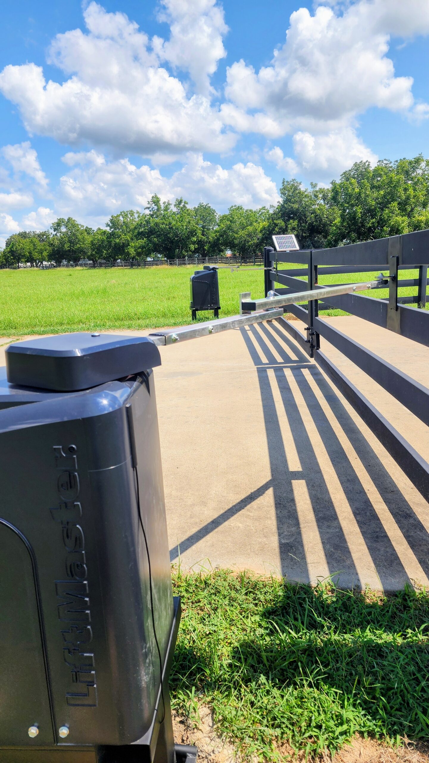 dual solar LiftMaster gate opener installation and service work in Houston