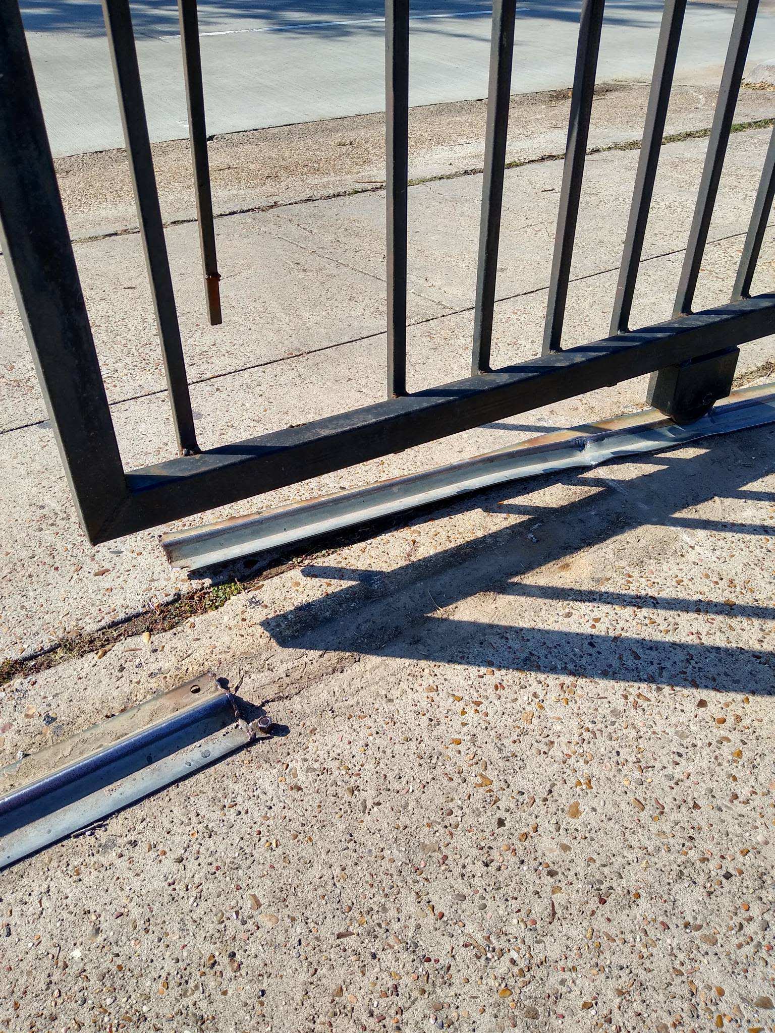 V-groove track repair for commercial slide gate in Houston