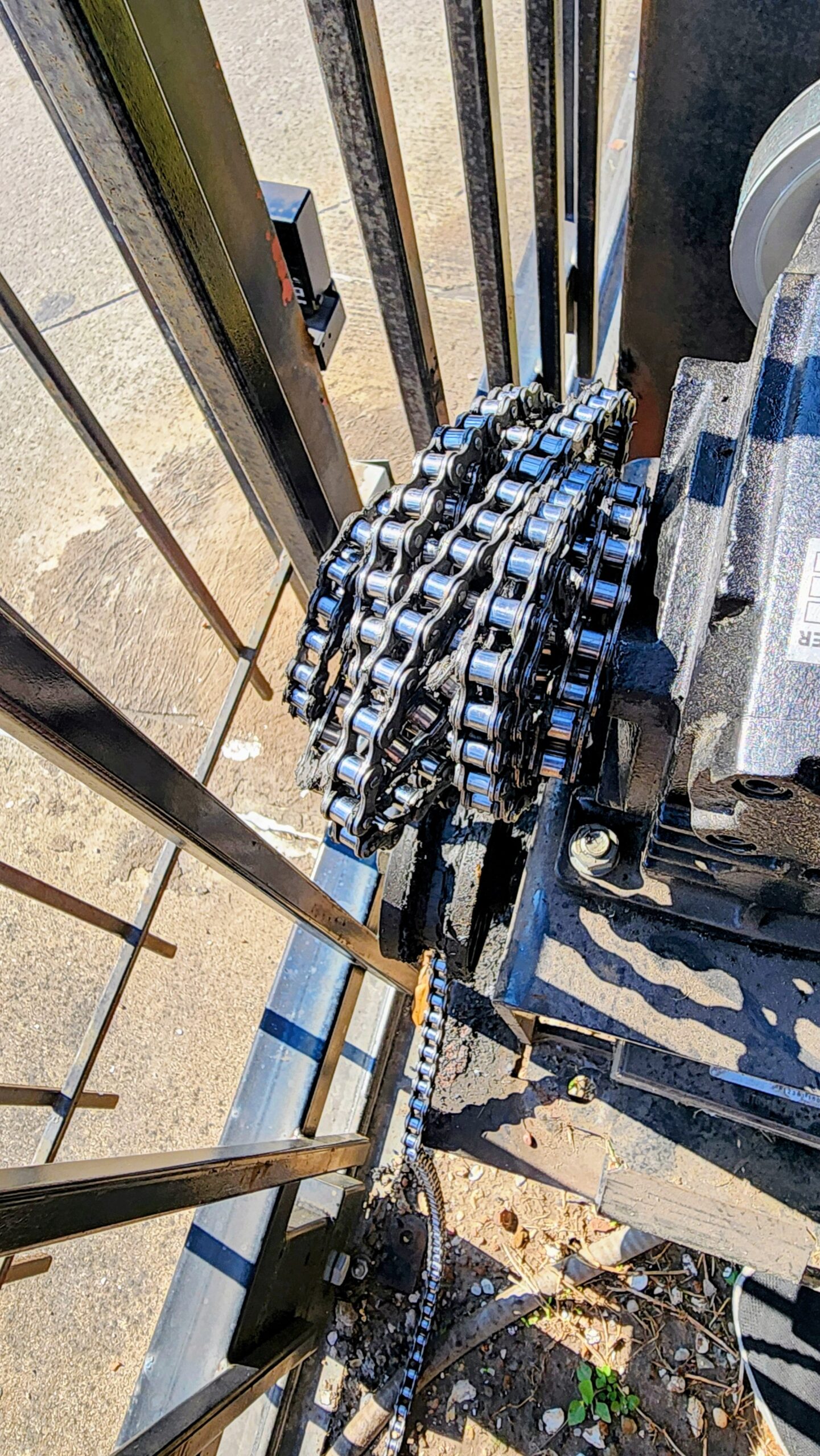 slide gate opener drive chain repair in Houston
