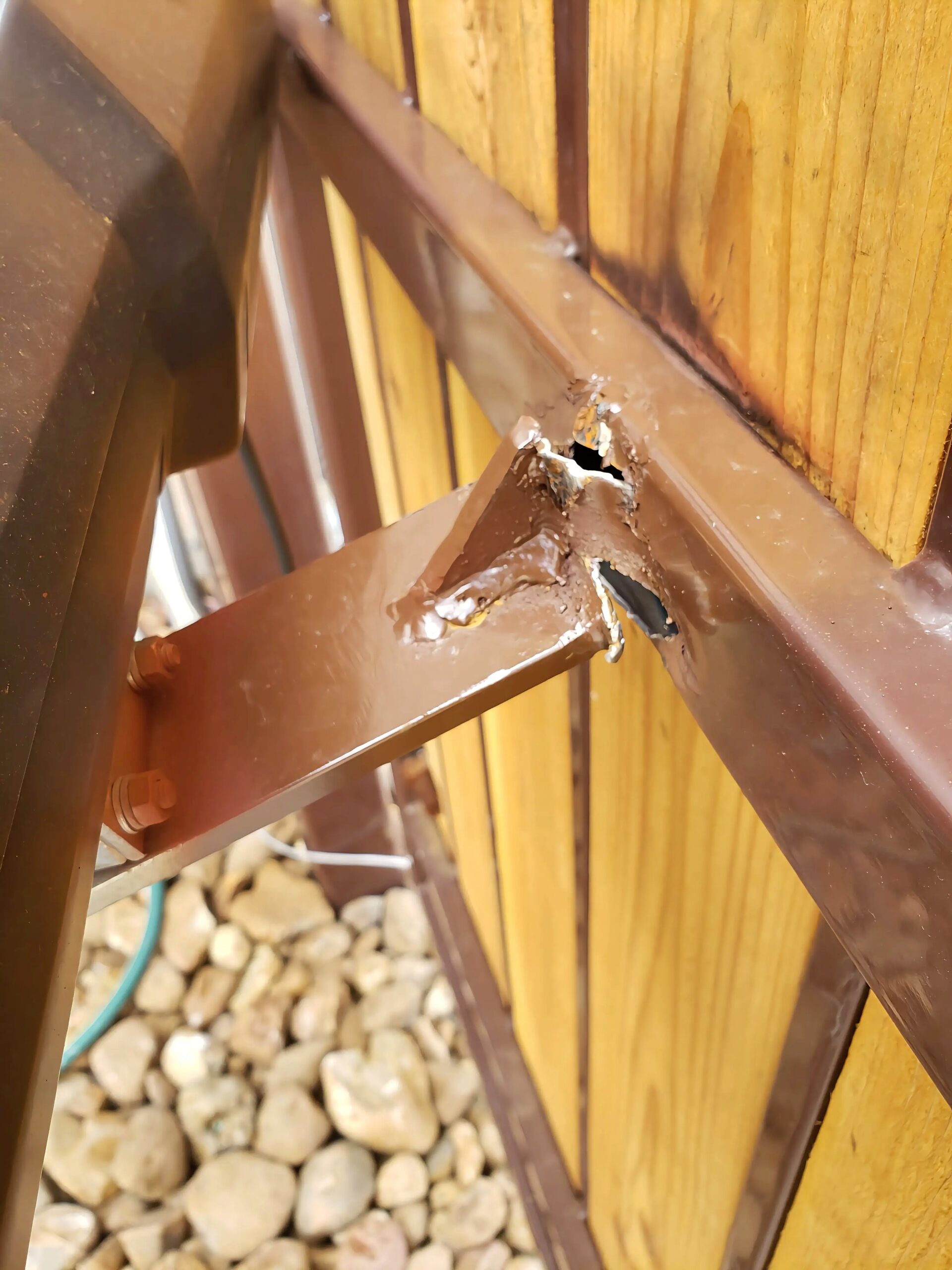 Swing gate opener bracket repair in Houston